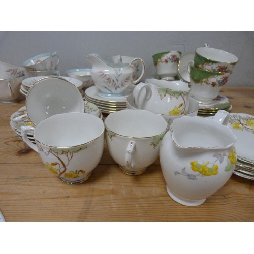 22 - Aynsley part teaset and two others to include Roslyn Springtime etc