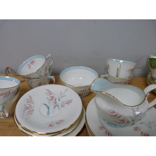 22 - Aynsley part teaset and two others to include Roslyn Springtime etc