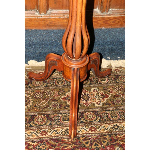 457 - 19th century walnut and mahogany tilt-top table, the oval top inlaid with marquetry floral design, r... 