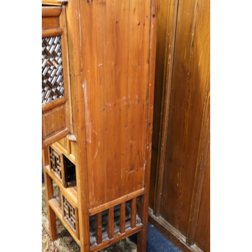 469 - Antique Chinese soft wood chicken coup cabinet of typical form with pierced doors raised on square s... 