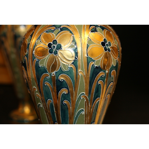 261 - Pair of MacIntyre Moorcroft Burslem Florian ware vases with pipelined decoration of gilded flowers a... 