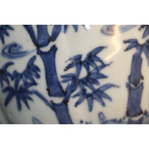 339 - Chinese 19th Century blue and white brush pot depicting a fisherman by a river in a mountainous land... 