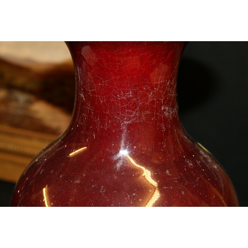 389 - A large 19th century Chinese flambé glazed baluster vase with deep red glaze and flaring to a white ... 