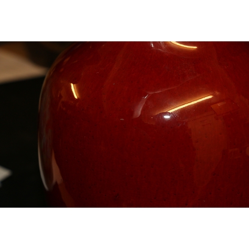 397 - A Chinese flambé glazed vase of baluster shape,  with speckled glaze and white rim, 36.5cm