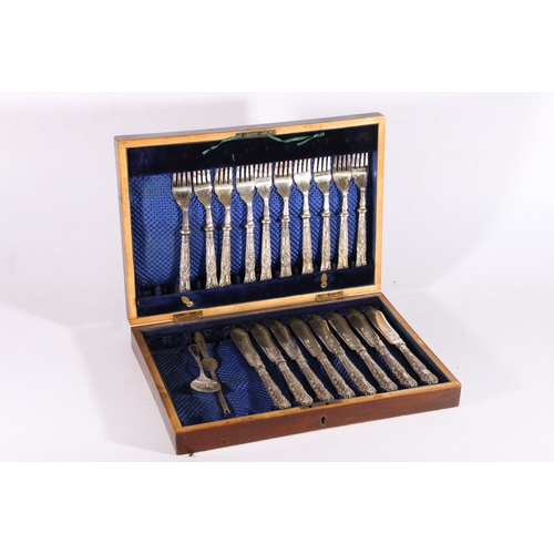 151 - Oak cased part silver-handled set of fish knives and forks, lobster pick, etc.