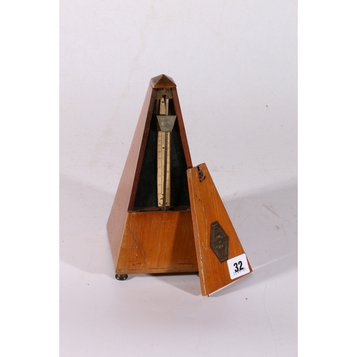 32 - French mahogany cased metronome.