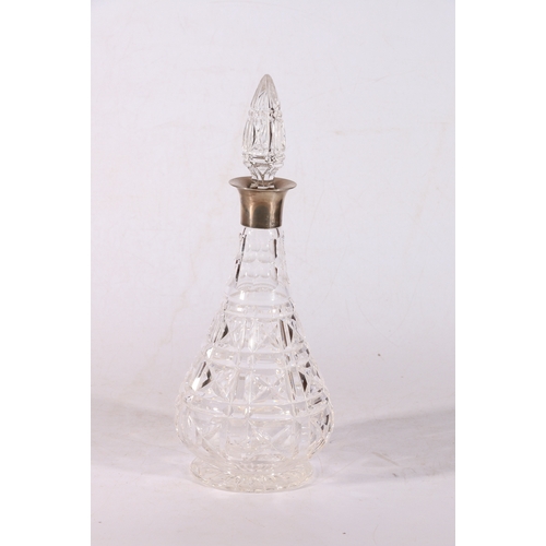 34 - Silver collared cut-glass decanter.