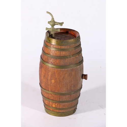 35 - Oak brass bound barrel with tap.