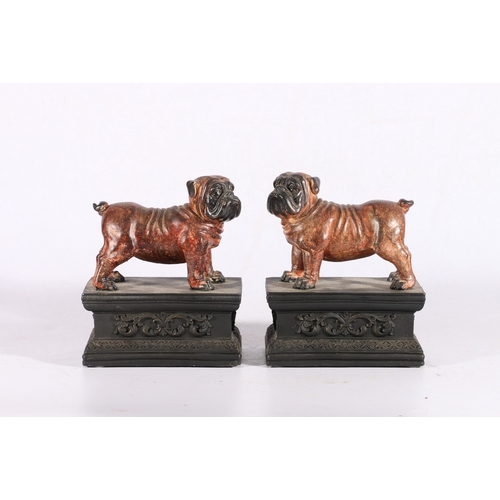 6 - Pair of bulldog bookends raised on plinth bases.