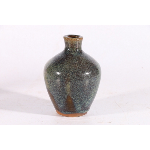 7 - Studio Pottery blue drip-glazed slender necked vase.