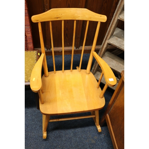 551 - Pine rocking chair.