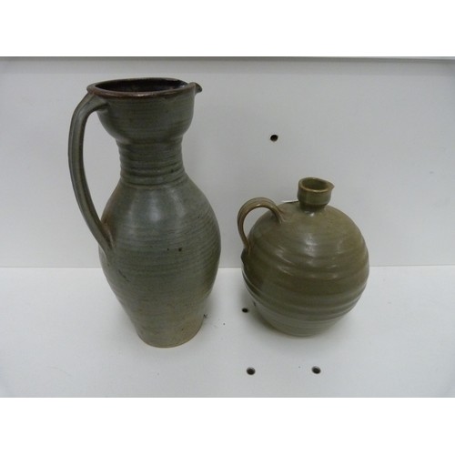 22 - Waimea pottery ribbed jug and another in blue glaze, larger, marked to base.