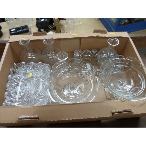 40 - Four heavily cut glass dishes and a pair of comports.