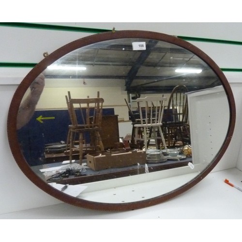 108 - Oval mahogany wall mirror.