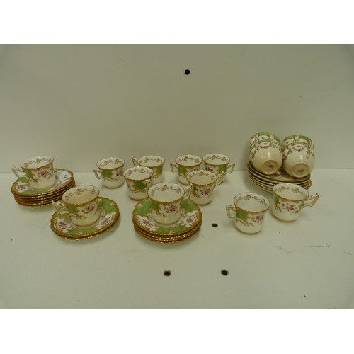 63 - White, green and floral tea set.