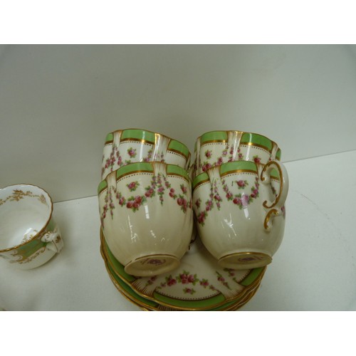 63 - White, green and floral tea set.