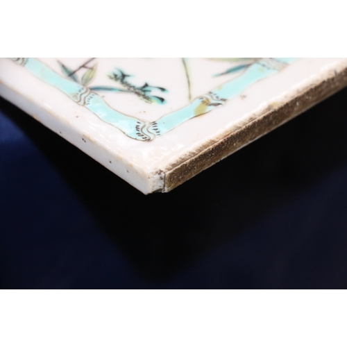 387 - Late 19th Century Chinese famille rose tile decorated with multiple cranes surrounding an old pine t... 