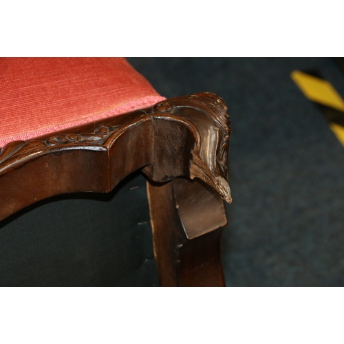 431 - Pair of Victorian mahogany wing back armchairs with carved and shaped skirt raised on cabriole suppo... 