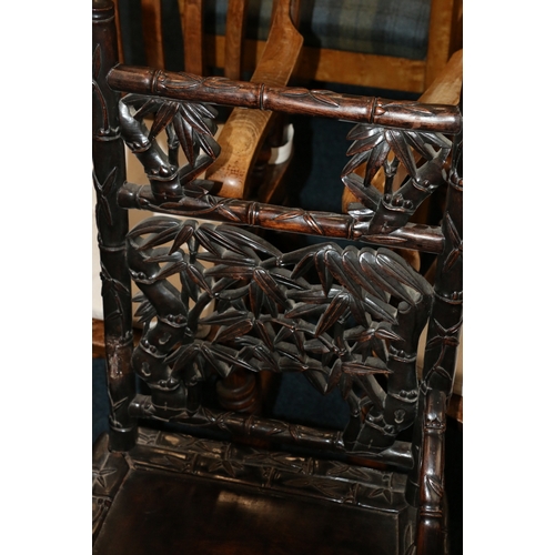 478 - Two antique Chinese padauk wood side chairs, both profusely carved and pierced with designs of birds... 