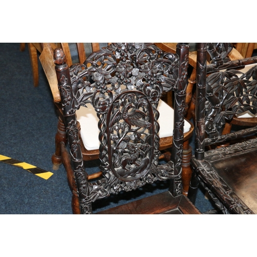 478 - Two antique Chinese padauk wood side chairs, both profusely carved and pierced with designs of birds... 