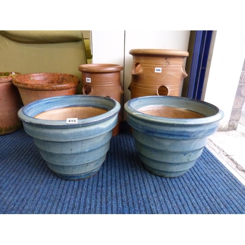 415 - Two large blue garden pots.