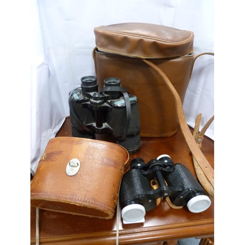 102 - Ironstone bowl, collector's plates, two pairs of binoculars, sugar scuttle and two glass vases.