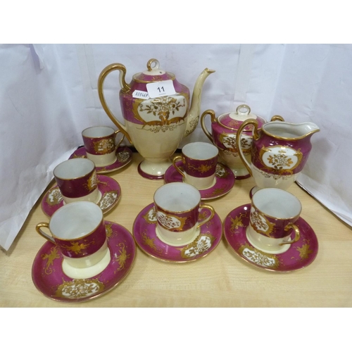 11 - Foreign parcel gilt tea set, Quimper jar and other ceramics.