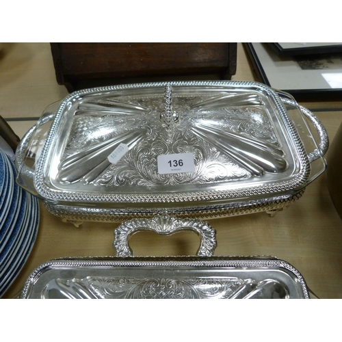 136 - Set of plated serving dishes.