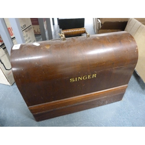 154 - Singer sewing machine.