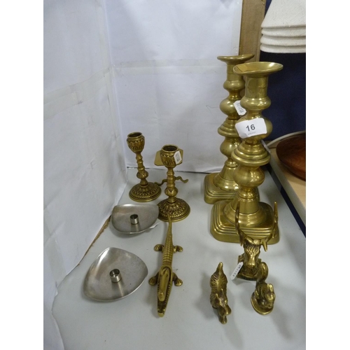 16 - Pair of brass candlesticks, pair of squat candlesticks, nutcrackers etc.