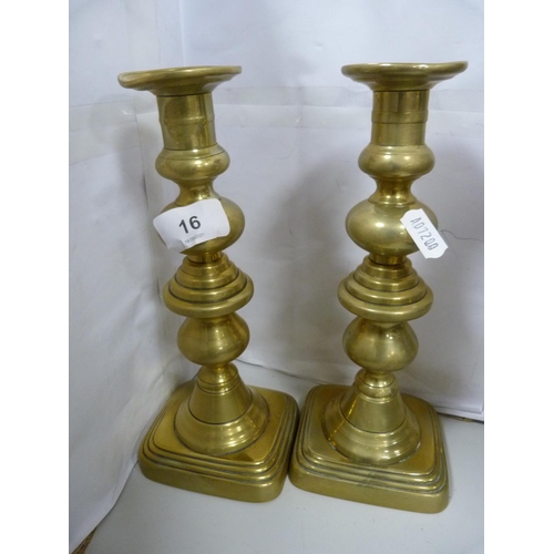 16 - Pair of brass candlesticks, pair of squat candlesticks, nutcrackers etc.