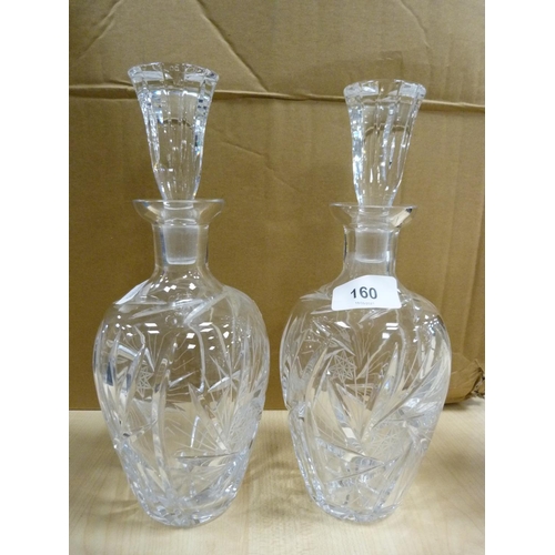 160 - Four decanters and three crystal glasses.