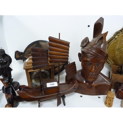 166 - Pair of vintage spurs, carved treen mantel clock etc.