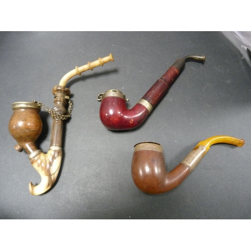 187 - Carton of assorted pipes, some silver and meerschaum, and others.