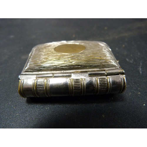 196 - Mauchline ware ring box for Edinburgh Castle and a vesta and coin case modelled as a book.