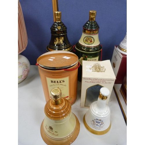 21 - Bottle of Bell's 12 year old whisky, two other Bell's whiskies in Wade Bottle and another, seal dama... 