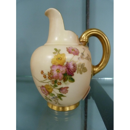 210 - Royal Worcester jug with floral and gilt decoration, no. 29115 1094.