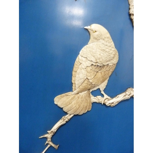 225 - Blue lacquered panel with applied decorated of hawk and bamboo.