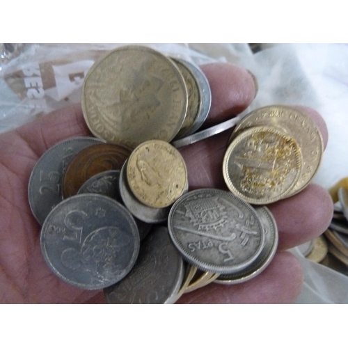 251 - Bag of assorted coins including 5p, pennies and foreign coins.