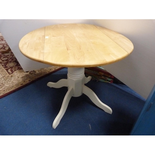 303 - Circular drop-leaf kitchen table.