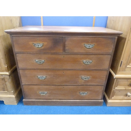 319 - Oak chest of two short and three long drawers.