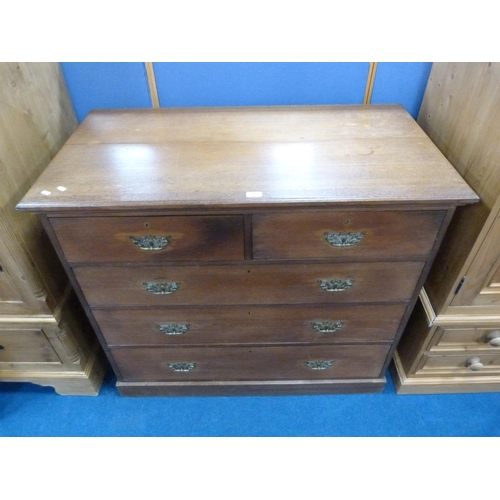 319 - Oak chest of two short and three long drawers.