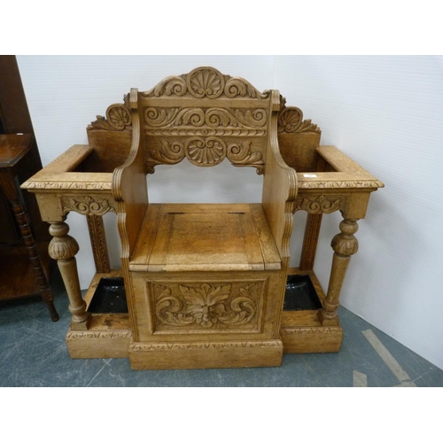 329 - Victorian oak umbrella stand with central hinged lid seat.