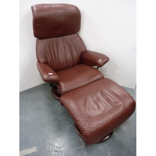 373 - Maroon recliner armchair and footstool.