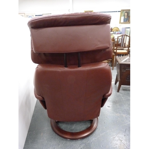 373 - Maroon recliner armchair and footstool.