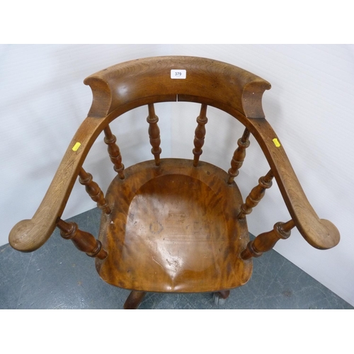 379 - Oak armchair.