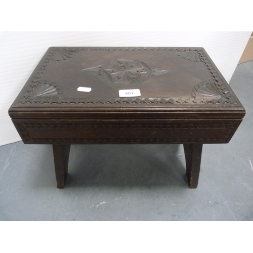 407 - Carved stool and a footstool.