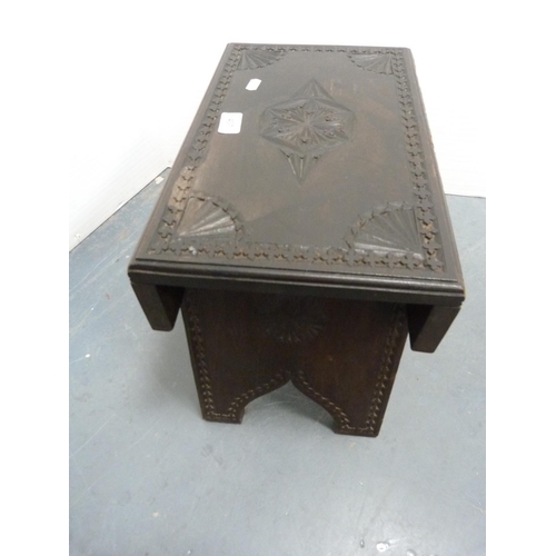 407 - Carved stool and a footstool.