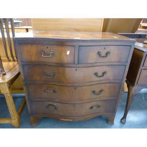 414 - Mahogany serpentine front chest of drawers.