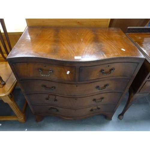 414 - Mahogany serpentine front chest of drawers.